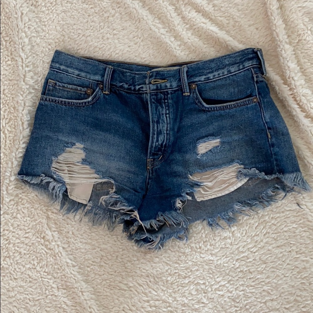 Free People distressed blue jean shorts